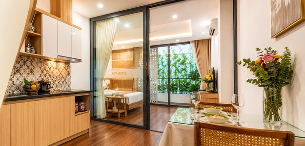 Phòng khách và bếp căn hộ MayHome (ảnh minh họa)